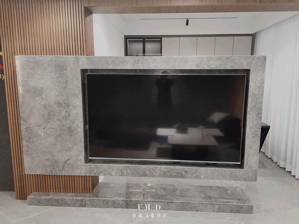 Remove the partition wall between the living room and the study room, and use a wall-mounted suspended TV wall as a partition to realize the interconnection and sharing of functional areas.