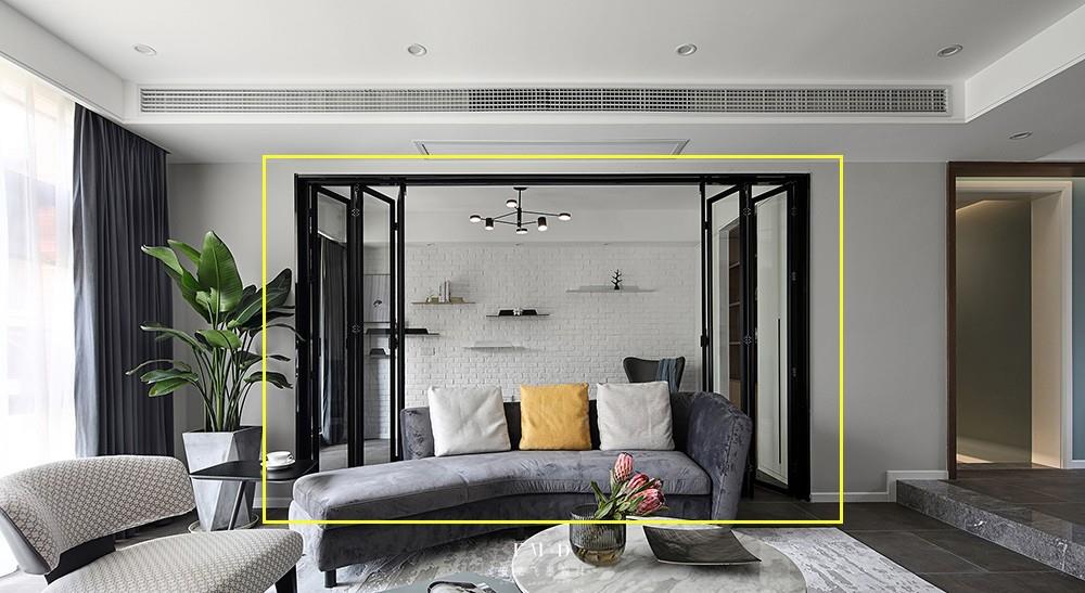 Remove the partition wall between the living room and the study room, and use a wall-mounted suspended TV wall as a partition to realize the interconnection and sharing of functional areas.