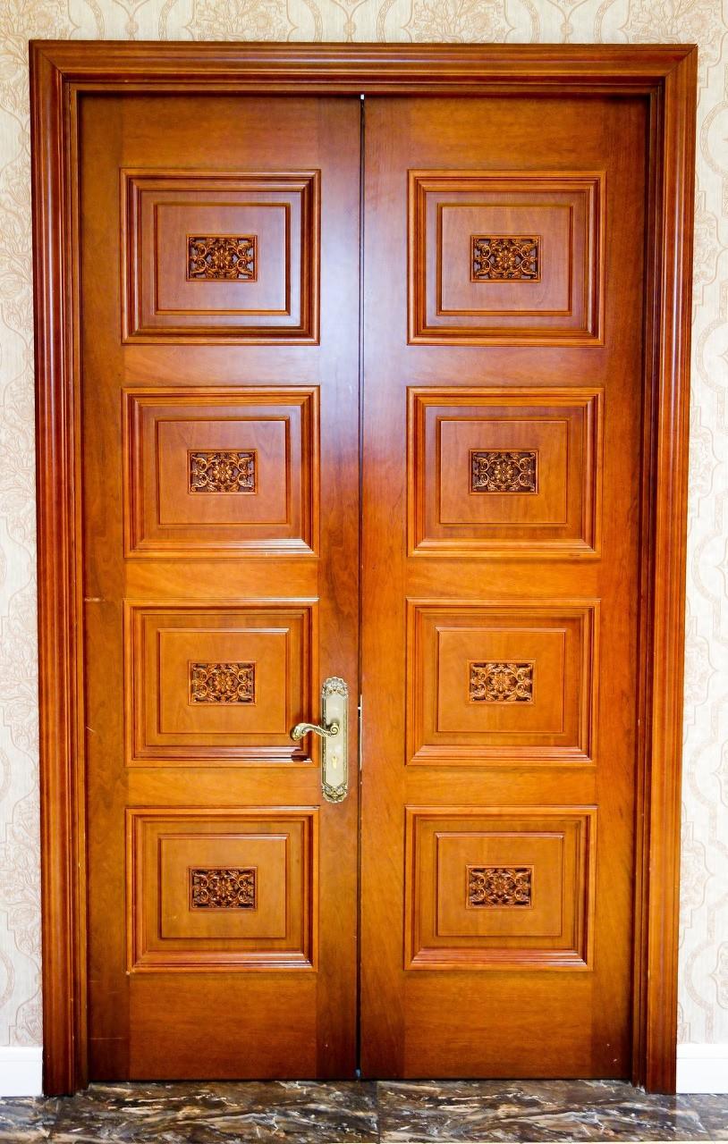 What material are solid wood doors made of?